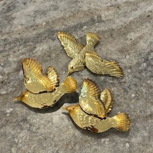 Gold metal bird wall decor